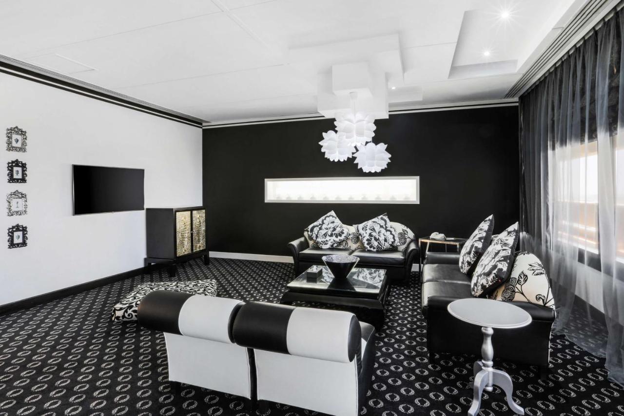 Radisson Blu Resort, Sharjah Bagian luar foto A 3D rendering of a living room